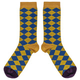 A pair of socks featuring a green and blue diamond pattern, on a white background