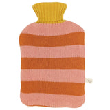 A knitted hot water bottle cover with horizontal stripes in pink and orange, featuring a ribbed yellow neck, shown against a plain white background.