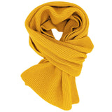 Yellow knitted scarf on a white background